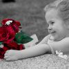 little_girl_red_roses