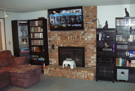 flat screen tv over the mantle