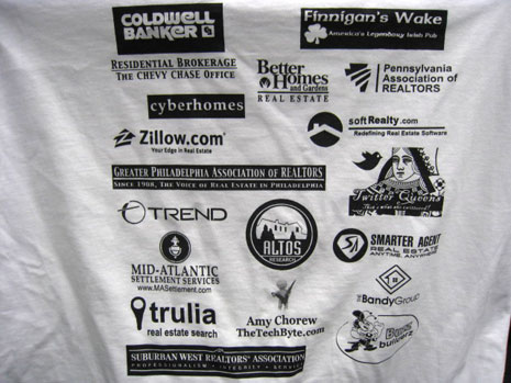 event t-shit covered in corprate sponsors