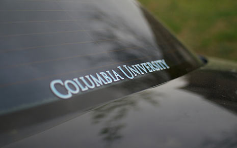 Image of a college sticker on the back window