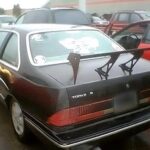 Your shit car and your even shittier spoiler!